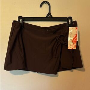 Brown swim bottoms. NWT size 12